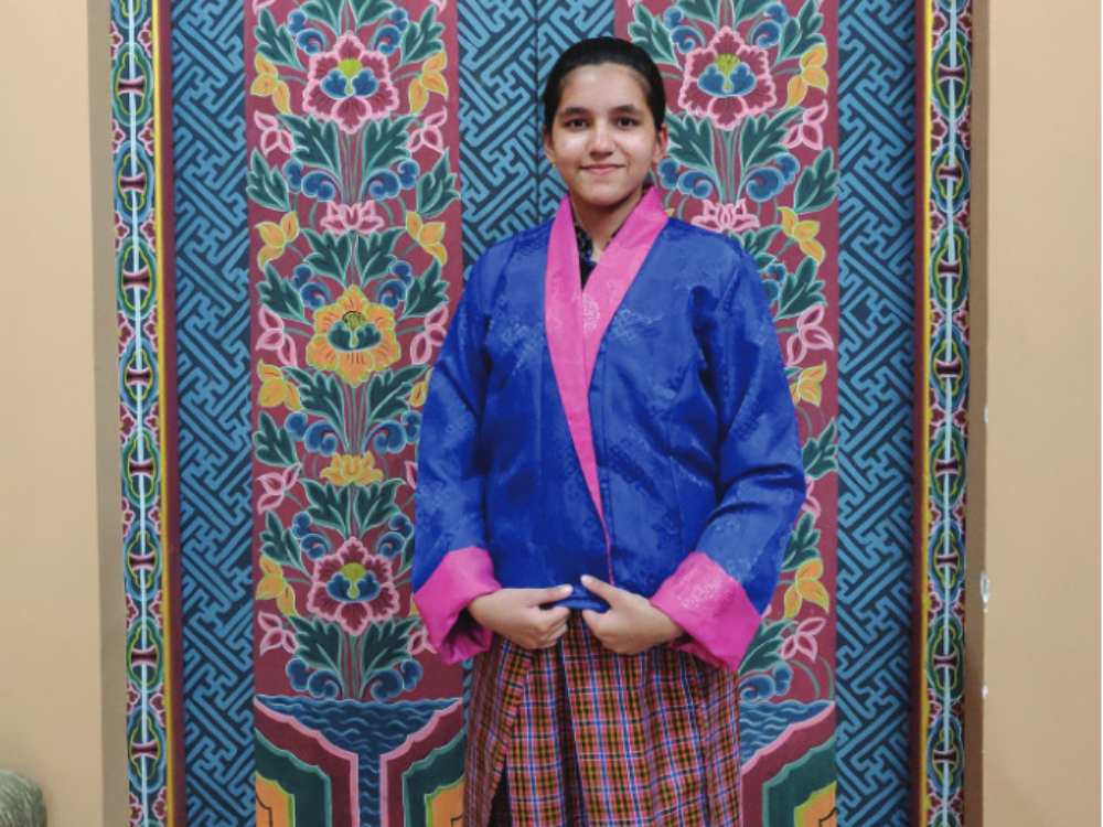 Ms Mishra in local traditional attire